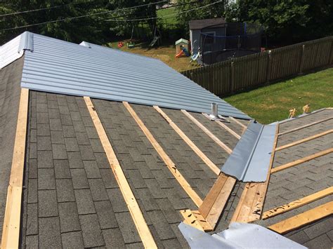 do they put metal roofs on houses|metal roof shingles disadvantages.